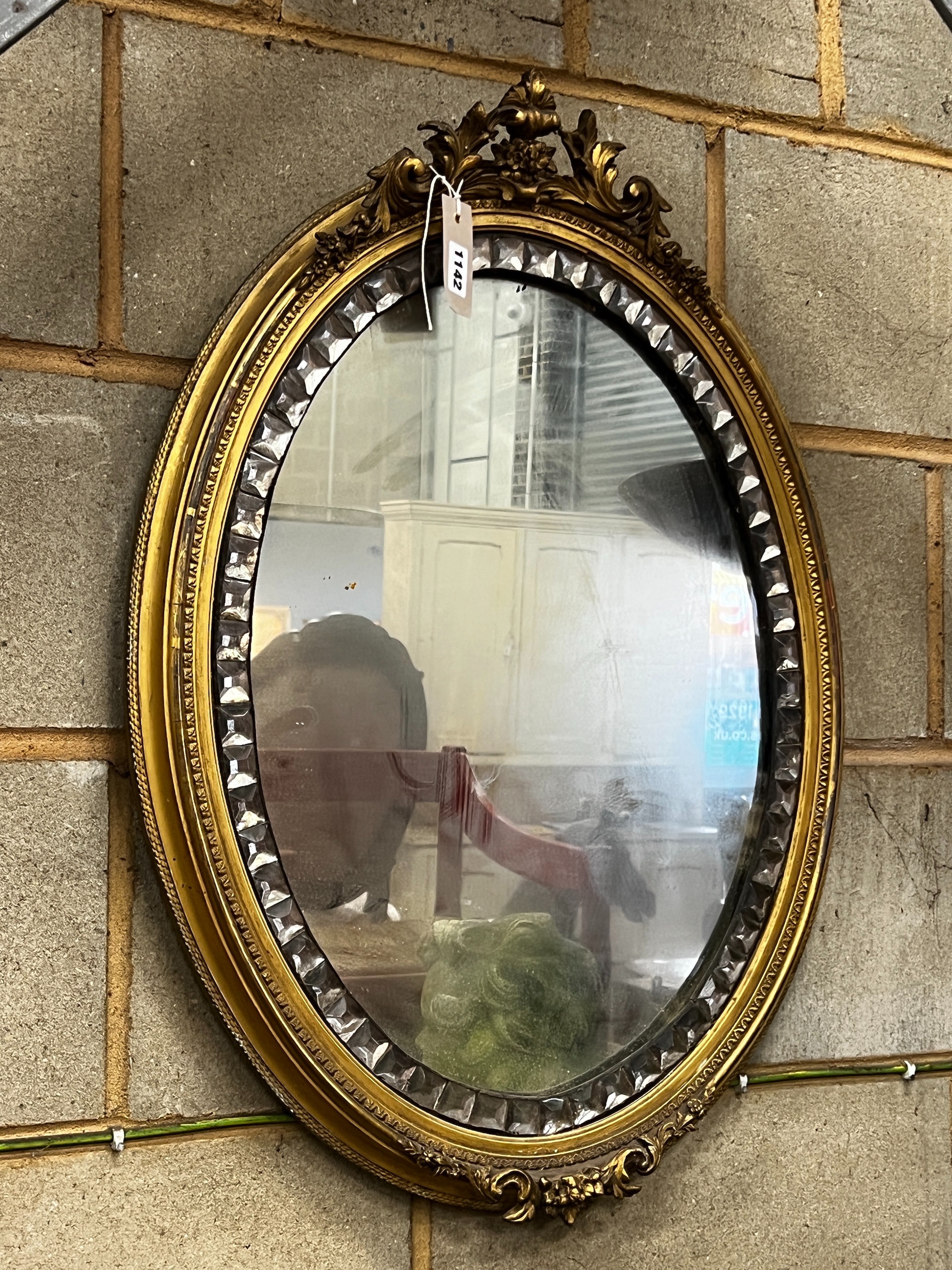 An Irish style oval mirror, width 54cm, height 72cm